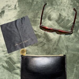 Stella McCartney Bordeaux color sunglasses with chain engraved